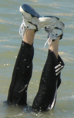 Swim in tracksuit and shoes